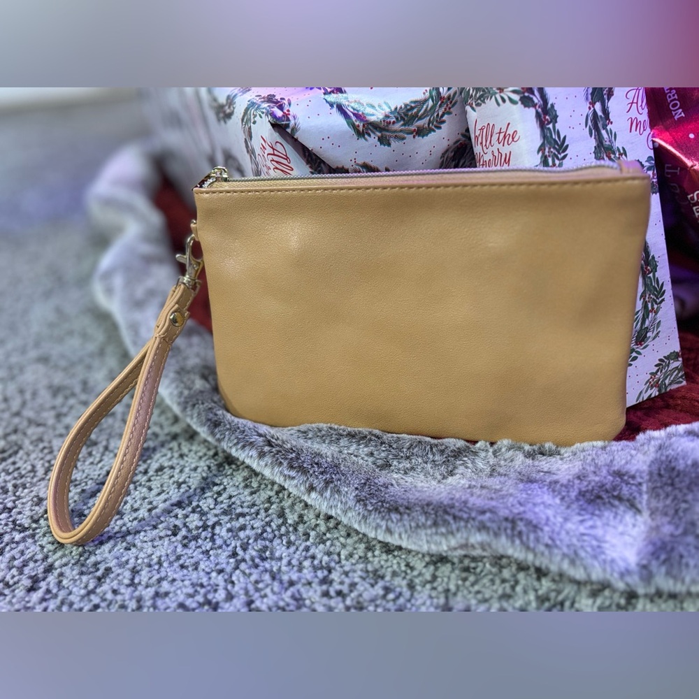 Elegant Tan Wristlet Clutch with Built-in Charging Bank